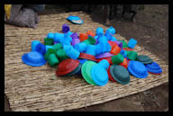 Empty food bowls about to be filled at the opening of a new feeding center in Mozambique, August 2008.